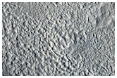 Margin of Crater Lobate Ejecta Blanket West of Phlegra Montes