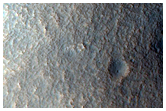 Layered Blocks Leaning against Slopes in Deuteronilus Mensae

