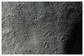 Potential Mountain Glacier Features Near Reull Vallis
