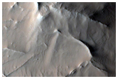 Layers in the Coloe Fossae Region
