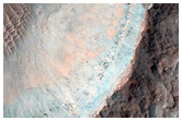 Monitor Slopes of Crater on Floor of Coprates Chasma
