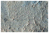 Eroded Crater on Floor of Kasei Valles

