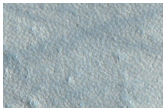 Pits on Crater Ejecta in Arcadia Planitia
