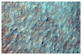Possible Layers in Southern Mid-Latitude Crater
