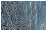 Layered Blocks Leaning against Slopes in Deuteronilus Mensae
