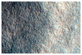 Well-Preserved Impact Crater on Northern Plains
