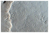 Channels and Eroded Fissure in Tharsis Region
