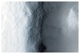 Crater and Adjacent Marte Vallis Flows
