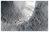 Small Fresh Impact Crater in Amenthes Fossae Region
