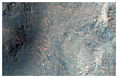Rim of Shambe Crater and Ladon Valles
