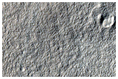 Ridges and Troughs in Crater East of Hellas Planitia
