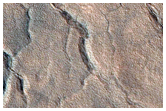 Monitor Slopes of Northern Mid-Latitude Crater

