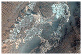 Valleys and Layering in Western Melas Chasma
