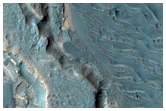 Possible Inverted Meanders in Filled Channel West of Ladon Valles
