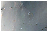 Upper Part of Fan and Drainage on Crater Rim Incising into Adjacent Crater
