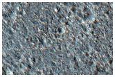 Heavily Pitted Streamlined Ejecta Lobe Originating from Mojave Crater
