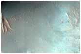 Crater Chain Cutting a Wrinkle Ridge
