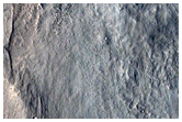 Small Fresh Oblique Impact Crater in Isidis Planitia
