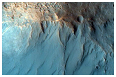 Ten Kilometer Crater with Unusual Ejecta
