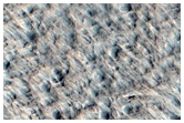 Small Crater with Bright Layer in Wall
