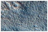 Impact Crater on Northern Plains
