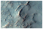 Deformed Crater on Huygens Crater Floor
