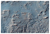 Tall Massif along Northeast Hellas Planitia Rim
