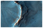 Diverse Bedrock Layers on Antoniadi Crater Floor
