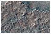 Valley Appearing to Transition to a Ridge in Solis Planum

