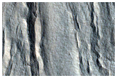 Crater Filled with Mantling Deposit in Far Eastern Acidalia Planitia

