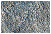 IR-Bright Crater in Amazonis Planitia
