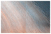 Seasonal Streaks on Scarp Exposing North Polar Layered Deposits
