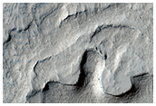 Enigmatic Pitted Uplift within a Depression in Noctis Labyrinthus