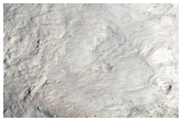 Well-Preserved Impact Crater on Alba Patera
