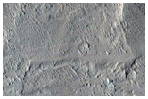 Possible Repetitive Bedding Near Base of Central Lobe of Medusae Fossae
