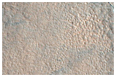 Impact Crater on Northern Plains
