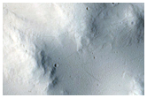 Well-Preserved Impact Crater in Marte Vallis
