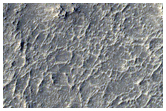 Exposed Crater Floor-Fill Strata in CTX G14_023815_2011_XN_21N307W
