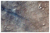 Fresh Impact Crater Formed between February 2005 and July 2005
