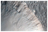 Fresh Crater in Claritas Fossae Region
