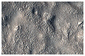 Layered Deposits in Crater in Hellas Montes Region
