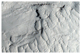 Resistant Cap Layer and Surrounding Terrain in Aeolis Region
