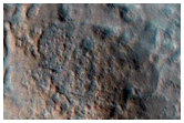 Possible Bedrock Exposure in Large Crater
