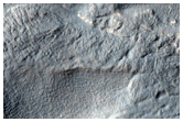 Hollowed Surface on Lobate Debris Apron in Hellas Planitia
