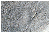 Crater with Pits Lined Up on Floor in Terra Cimmeria