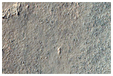 Tongue-Shaped Features on Crater Wall in THEMIS Image V26498011
