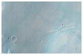 Mounds and Small Ridges along Wrinkle Ridge on Huygens Crater Floor

