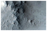 Central Peak and Ejecta of 7-Kilometer Crater in Daedalia Planum
