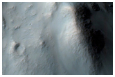 Crater on Floor of Dejnev Crater
