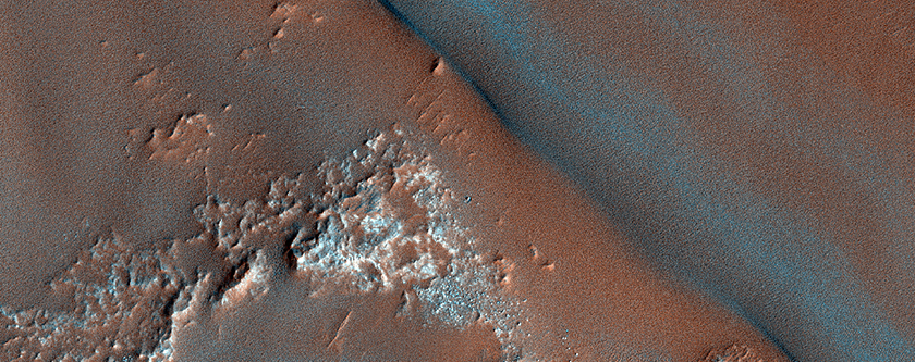 Possible Flow Features in a Crater in the Nereidum Montes Region

